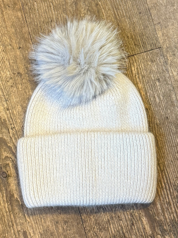 Italian knit pom caps